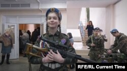 Кадр из фильма "Уездный город Е"